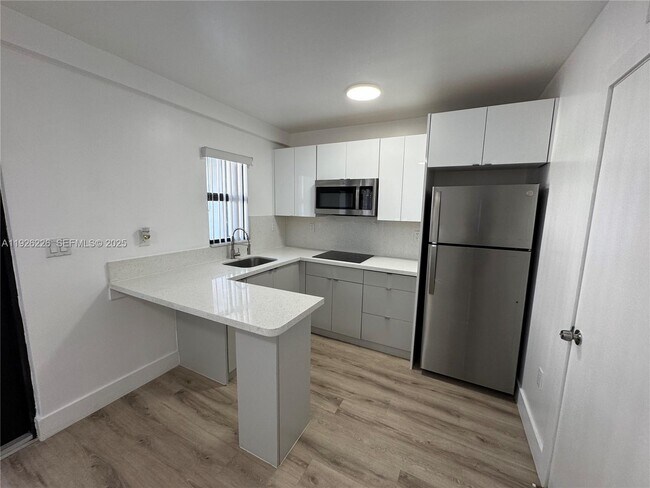 Building Photo - 1969 NW 2nd Ct