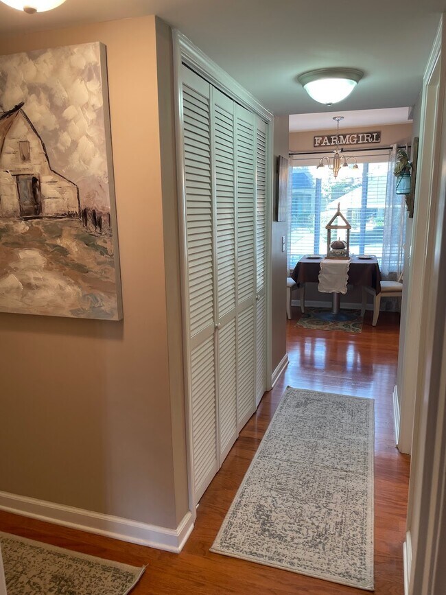 Hall (taken from bedroom door with laundry to the left, kitchen straight ahead and bathroom on right - 4487 Post Pl