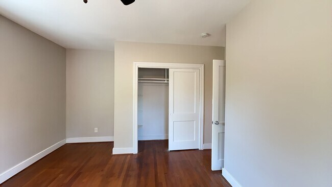 Building Photo - Charming 2BR with Sunroom, Hardwood Floors & Lawn Care Included