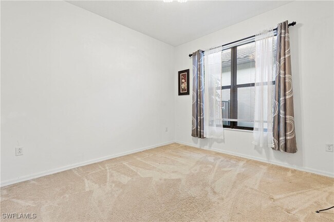 Building Photo - 8976 Madrid Cir