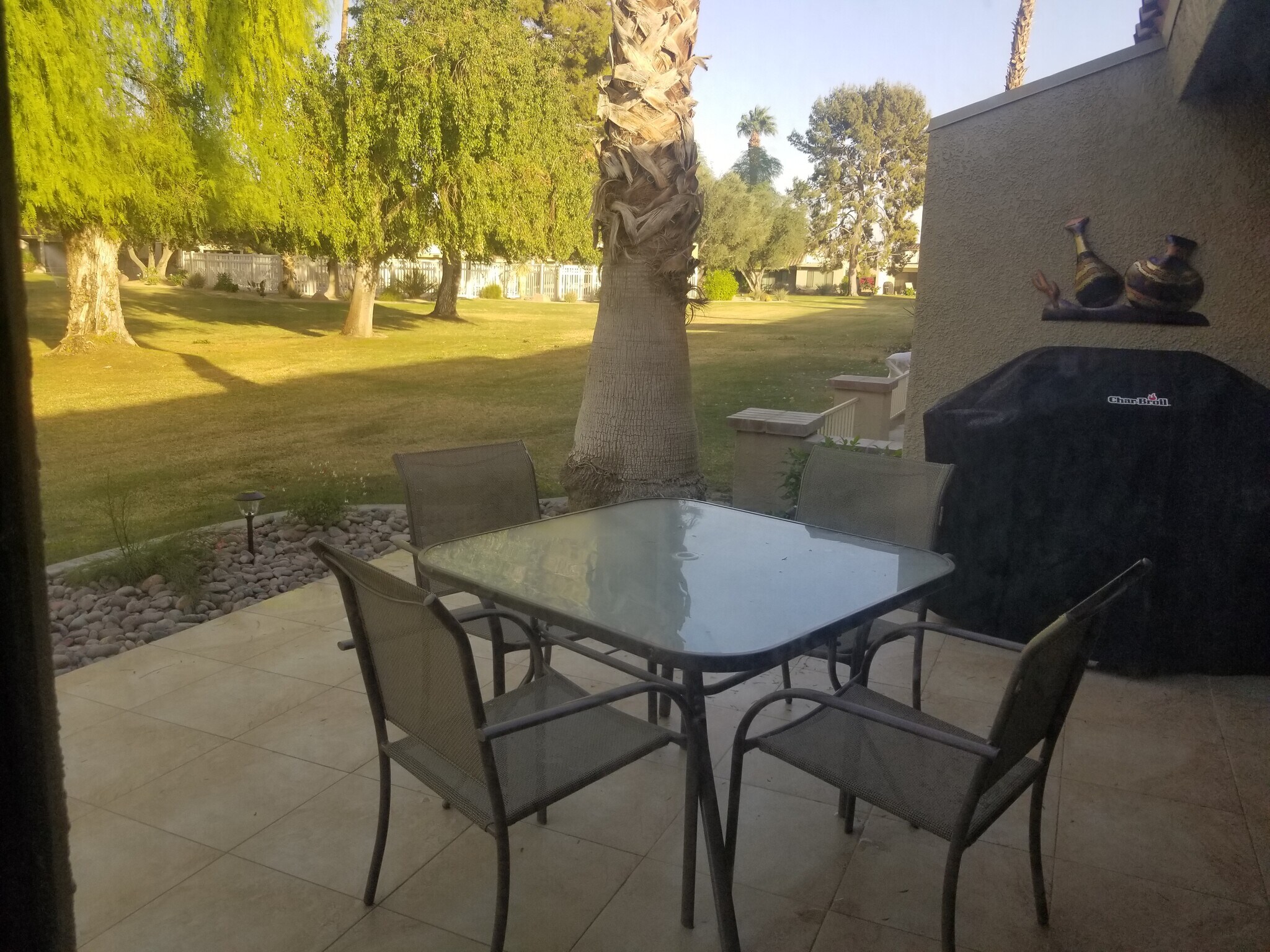 Patio looking at greenbelt & pool - 77402 Preston Trl