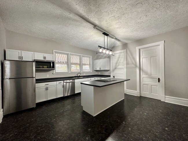 Building Photo - Updated 3-Bedroom Gem with Classic Charm a...
