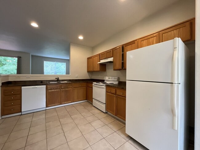Building Photo - Spacious Three-Story Townhome Near Orenco Station with Attached Garage, Private Balcony, and Vaul...