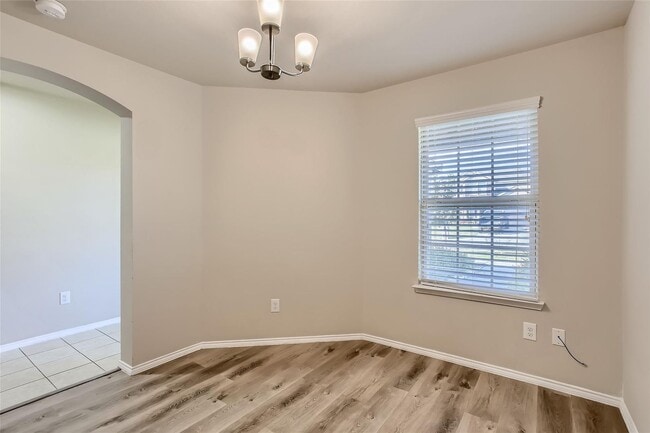 Building Photo - This well-maintained 4 bedroom home is located in a quiet neighborhood that has a community park ...