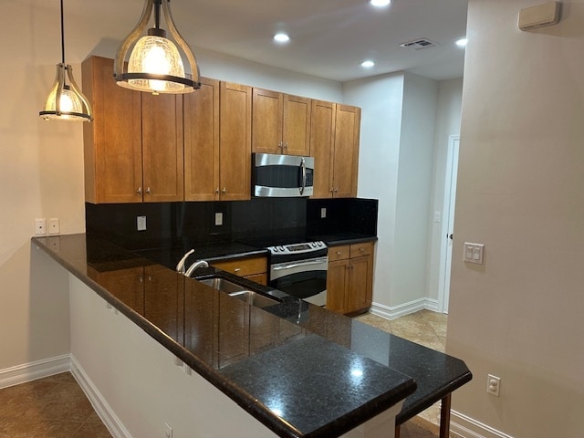 Wood cabinets, black granite countertop - 10261 Olivewood Way