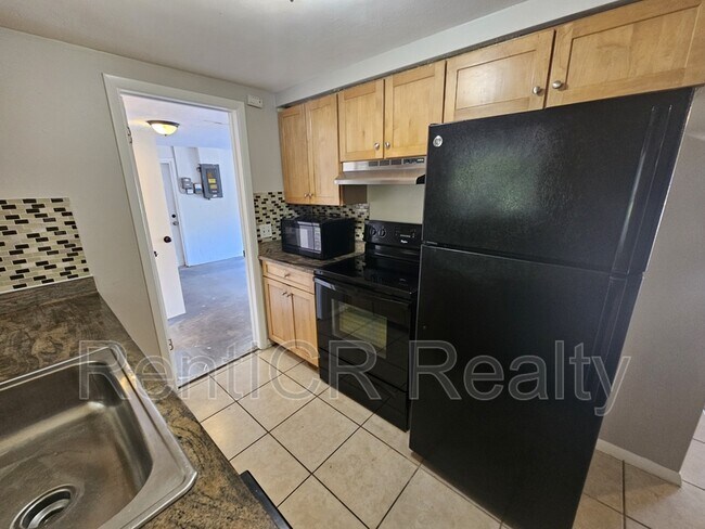 Building Photo - 7734 Candle Dr