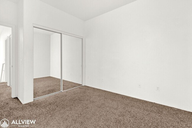 Building Photo - Spacious Coastal Condo with Rooftop Ocean ...
