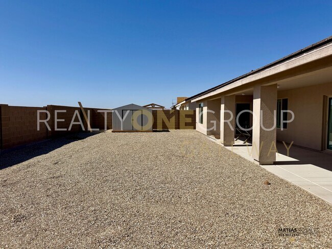 Building Photo - Enjoy those Arizona Sunset in this Three B...