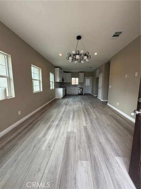 Building Photo - 7398 N Maple Ave