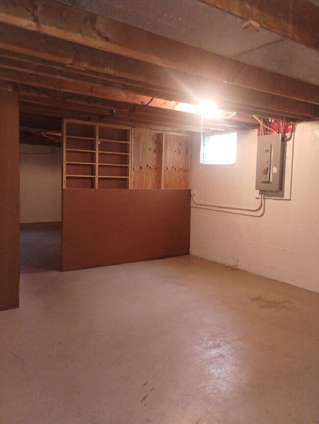 Building Photo - Quaint Duplex with a private Basement, Garage Space & Patio