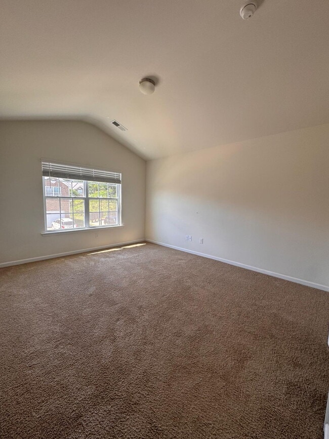 Building Photo - Modern 3-Bedroom Multiplex with 3 Full Bat...