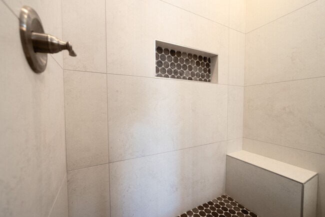 Building Photo - Elegant Home with Stone Fireplace, Kitchen Island and Designer Primary Suite