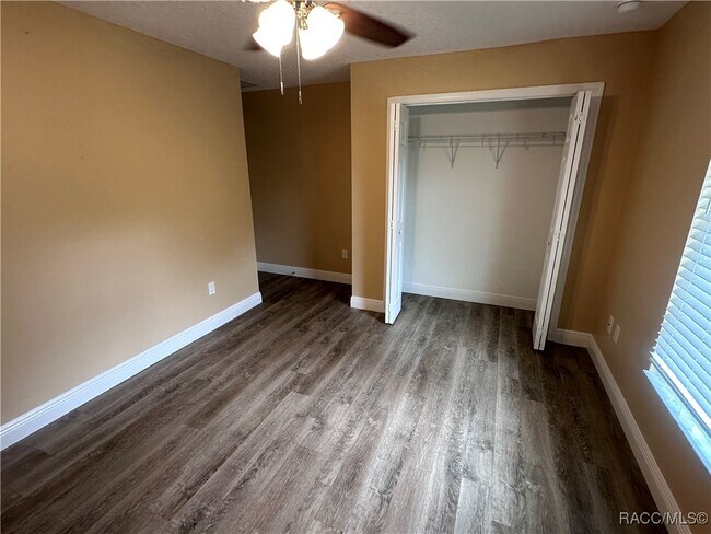 Building Photo - 7779 N Triana Dr