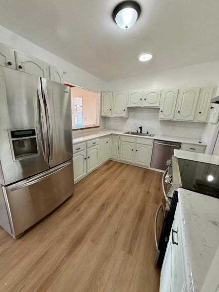 Building Photo - 1120 Ave H-6