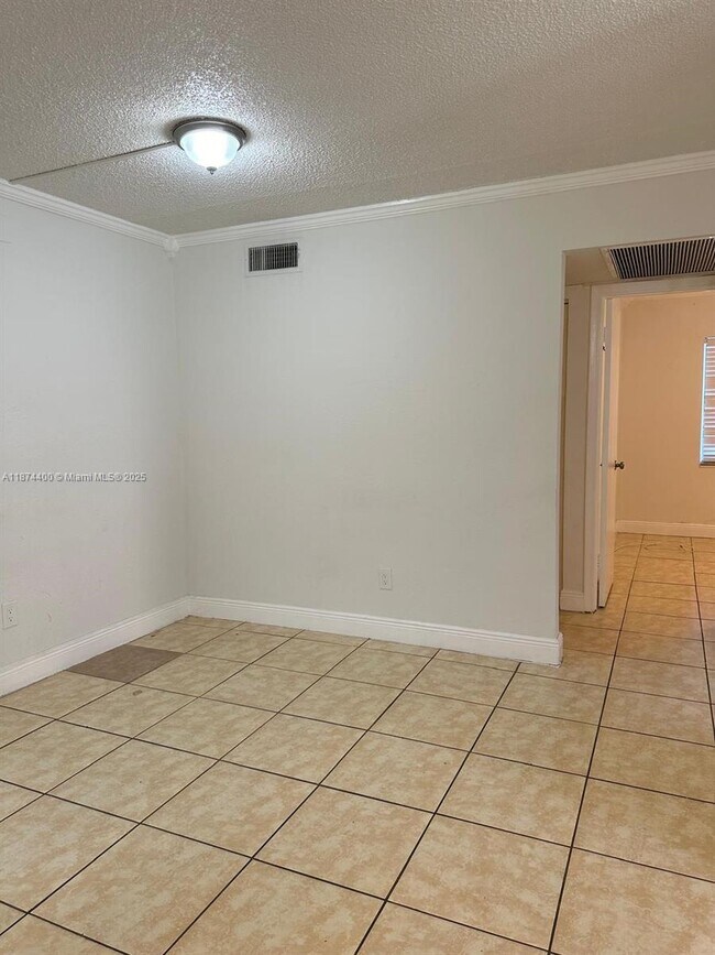 Building Photo - 6705 W 26th Dr
