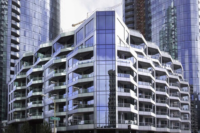 Building Photo - Stunning LUMINA Condo with Bay Views