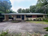 Building Photo - 4BR/3BA with Detached Garage Conversion Av...