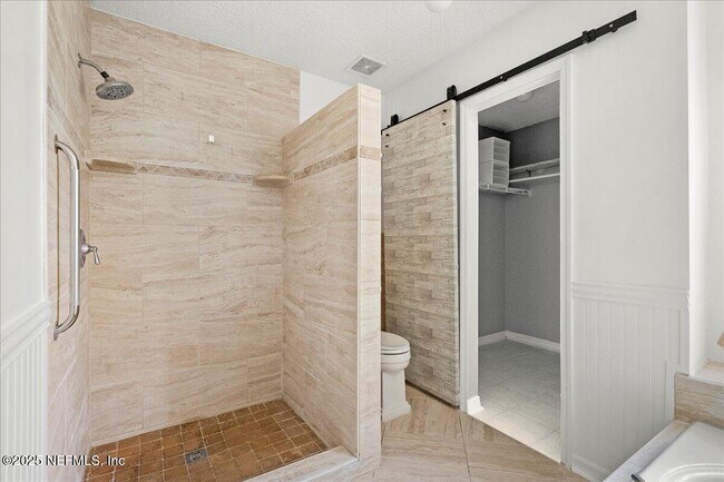 Building Photo - 10334 Triple Crown Ave