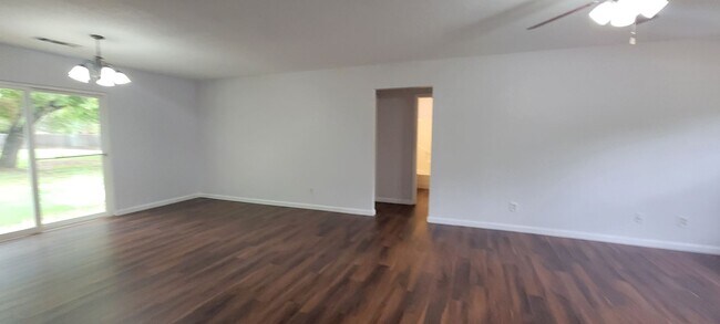 Building Photo - FRESHLY REDONE in 2023 - New floors, fresh...