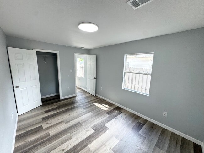 Building Photo - GORGEOUS REMODELED 3BR/2BA Zephyrhills Home with HUGE SCREENED IN PORCH and Shed