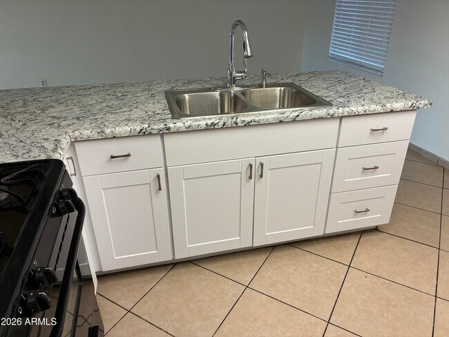 Building Photo - 8819 W Roma Ave