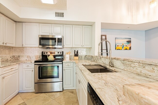 Building Photo - End-Unit 3-Bed Condo Near Downtown Naples & Beaches | Gated Resort-Style Community