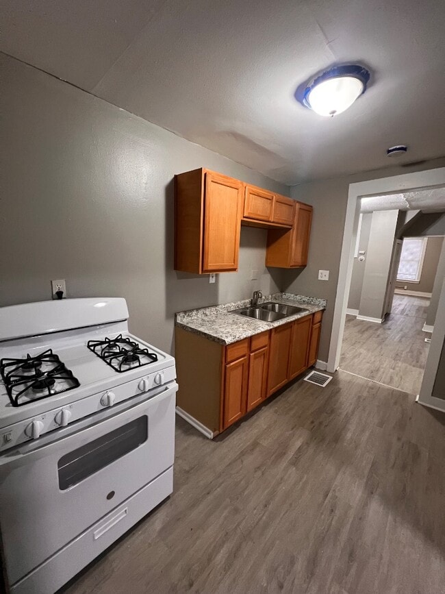 Building Photo - Fully Renovated 5-Bedroom, 2-Bath Single-Family — Driveway + Water, Sewer & Trash Covered