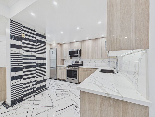 Building Photo - Stylish & Updated 1BD/1BA Condo in Secure Caldecott Community – Parking + In-Unit Laundry