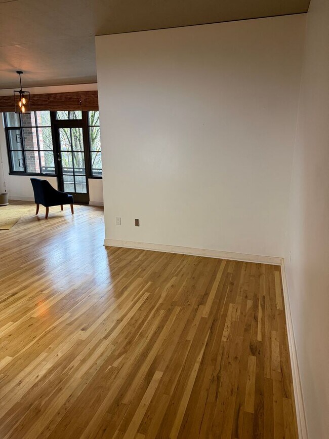 Building Photo - McKenzie Lofts - 2nd floor west facing studio w/parking/storage/covered balcony