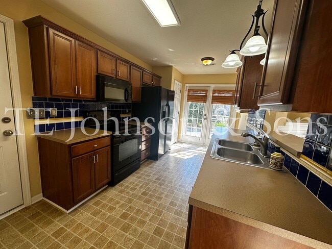 Building Photo - Spacious 3 Bedroom Home with Primary Suite on Main, Gas Fireplace & Patio in Advance!