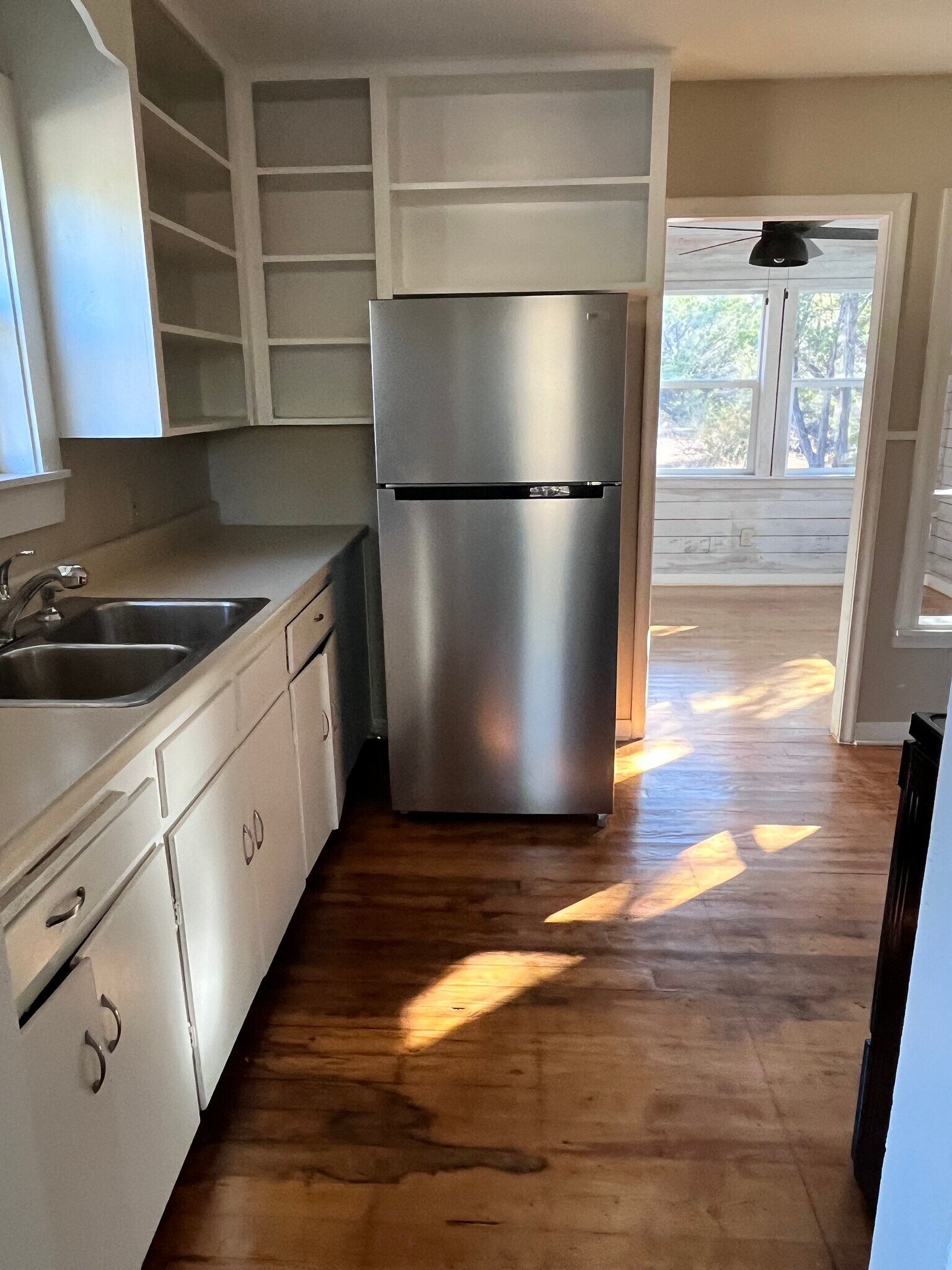 Full size fridge and entrance to sun room - 1565 Pump Station Rd