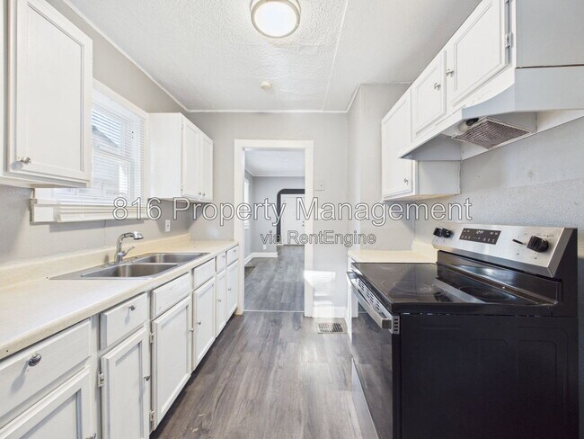 Building Photo - 6808 S Benton Ave