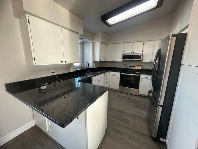 Building Photo - Quiet neighborhood, 3 bedroom, 2 bath home, huge front patio/deck, RV parking!