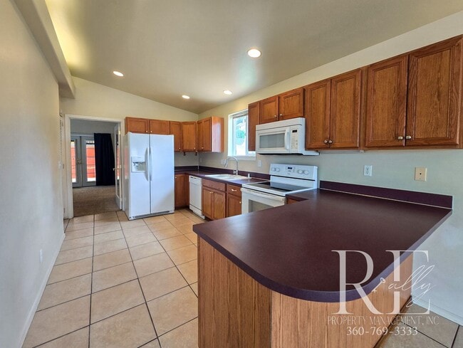 Building Photo - 3-Bed Townhome w/ Private Outdoor Spaces &...