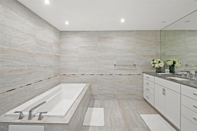 Building Photo - 10205 Collins Ave