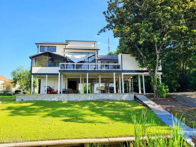 Building Photo - Riverfront Living with Private Boat Launch