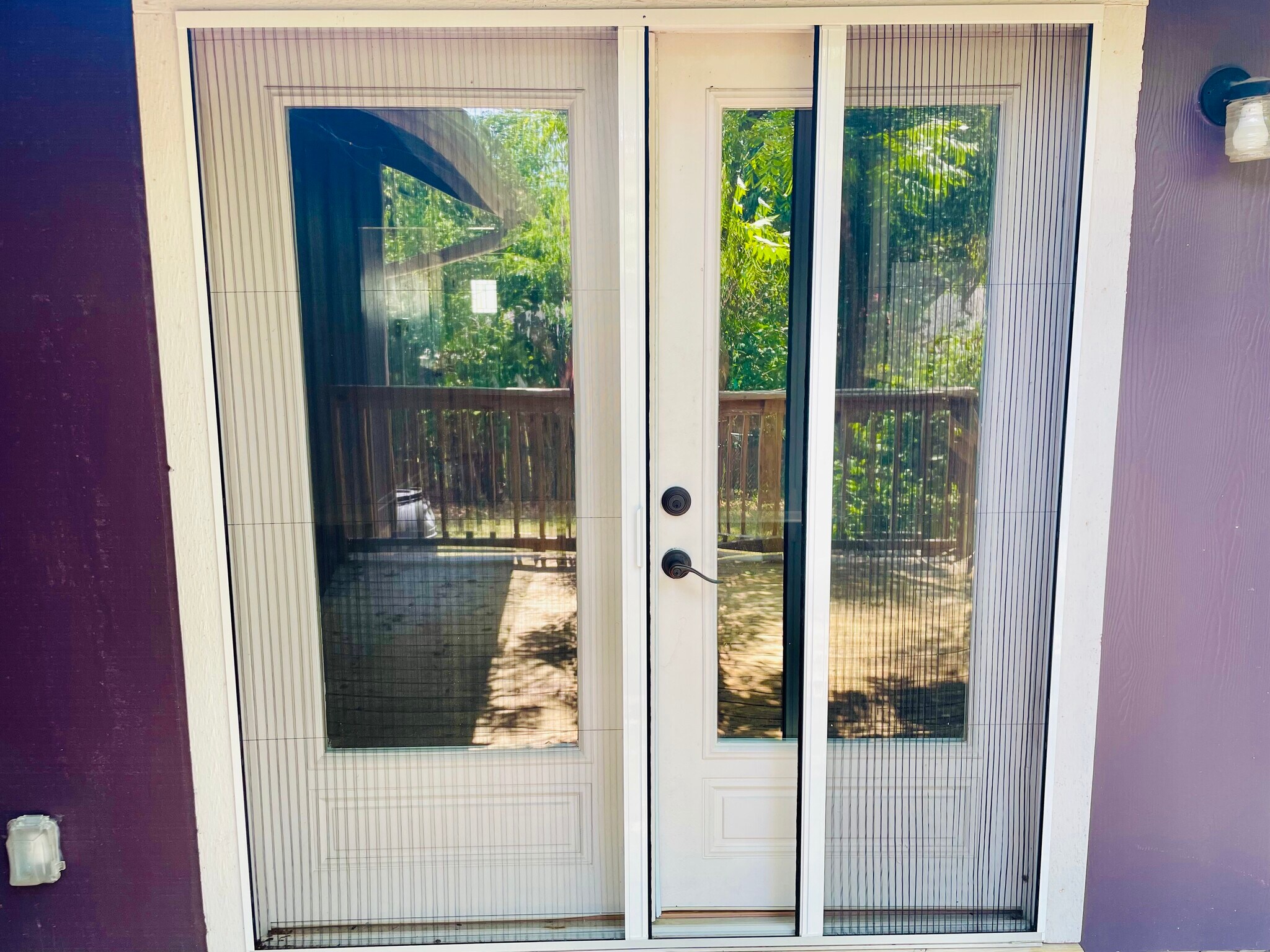 French doors with retractable screens - 6717 Tulsa Cove