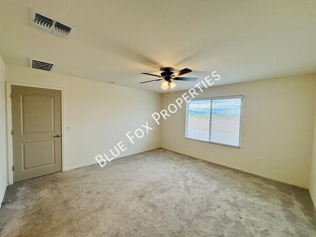 Building Photo - 6563 W Camino Pizarro