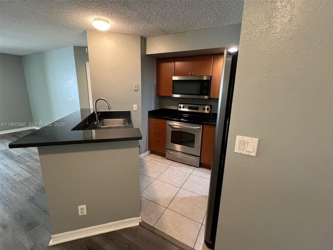 Building Photo - 3350 Pinewalk Dr N