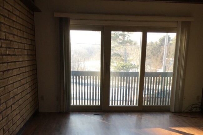 Living room and deck - 2639 Knapp St