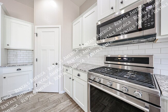 Building Photo - 10556 E Nichols Ave