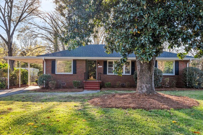 Building Photo - NW - Large Brick Ranch, Updated, Hardwoods, LR, DR, Den, Two Decorative Fire Places, Fenced, Stor...