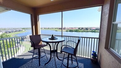 Building Photo - Elevated Luxury at The Terraces – 4th Floor Lake & Golf Course Views! 55+ Community!