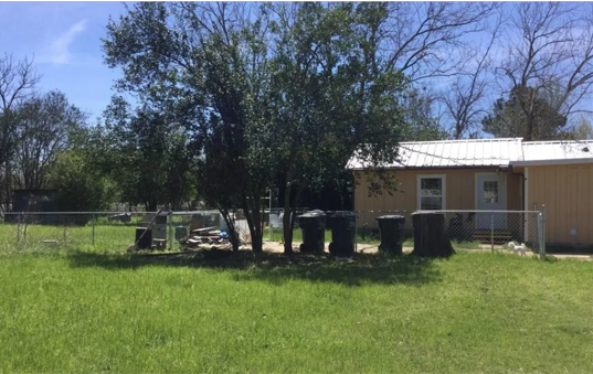 Yard has Dog Fence Area - 1125 Gravel St