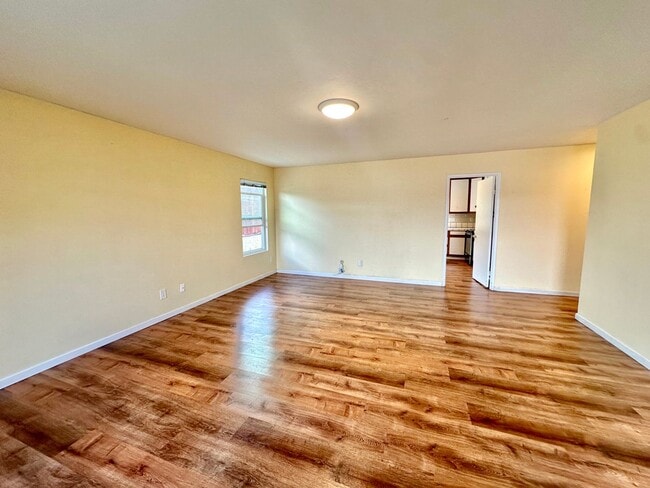 Building Photo - Remodeled 4 bedroom with central A/C and 2 car garage!