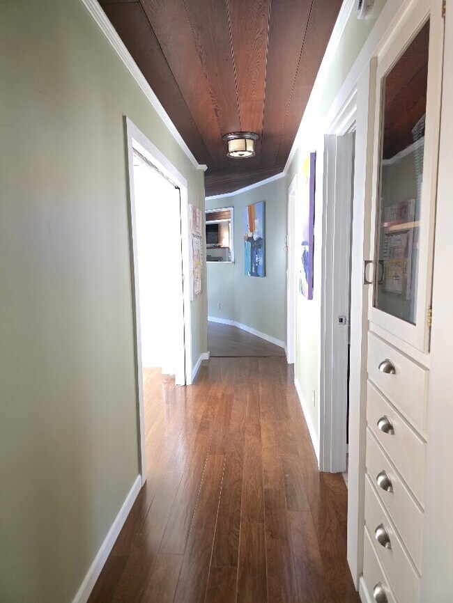 Building Photo - Breathtaking Home offers flexible living with bonus rooms ideal for an office, art studio, gym, o...