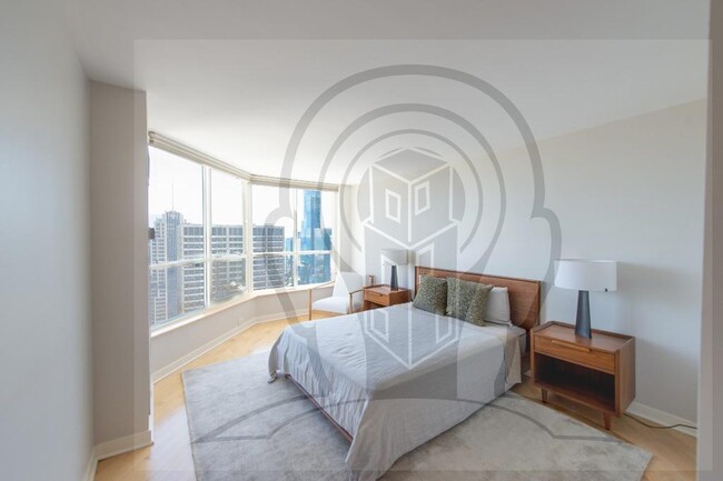 Building Photo - Stunning 46th Floor, 2 bedroom condo, righ...