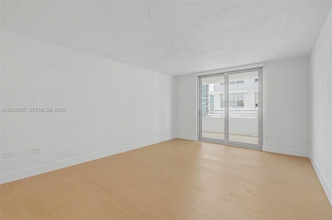 Building Photo - 5555 Collins Ave