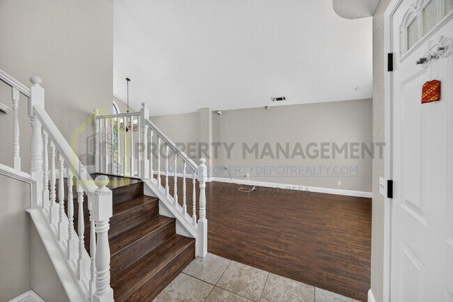 Building Photo - Spacious 4-Bedroom Retreat with 2.5 Baths