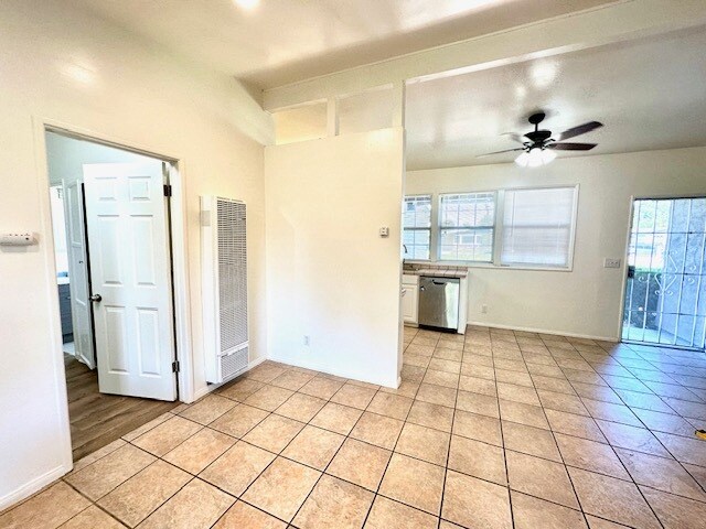 living room to kitchen with master door - 620 Van Wig Ave